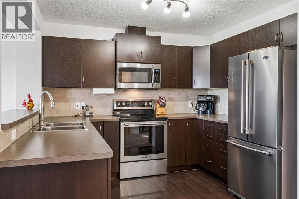150 River Heights Crescent, Cochrane, Alberta  T4C 0J5 - Photo 3 - A2308392
