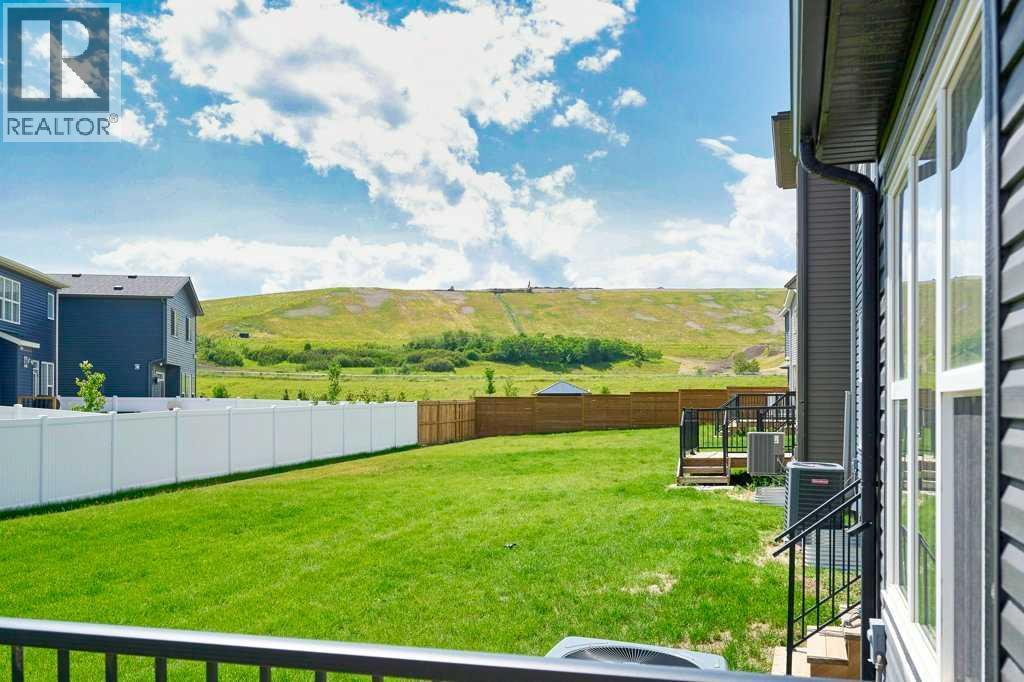 103 Wolf Creek Rise SE, Calgary, Alberta  T2X 4Z2 - Photo 18 - A2275919