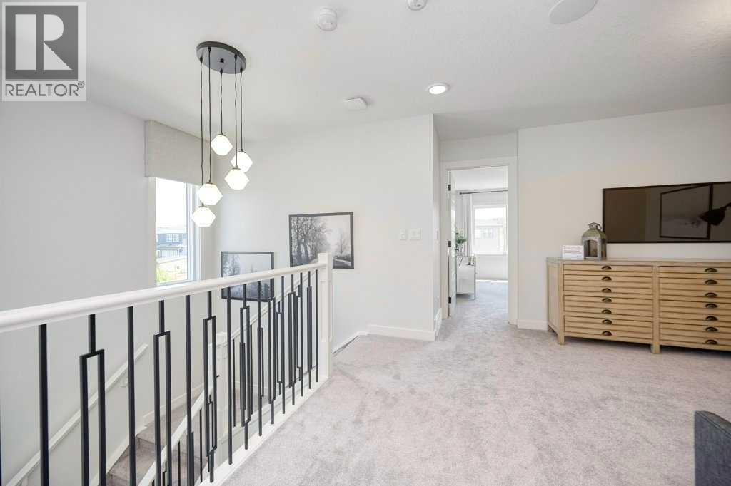 103 Wolf Creek Rise SE, Calgary, Alberta  T2X 4Z2 - Photo 21 - A2275919