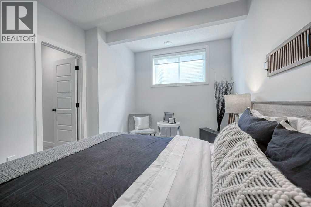 103 Wolf Creek Rise SE, Calgary, Alberta  T2X 4Z2 - Photo 39 - A2275919