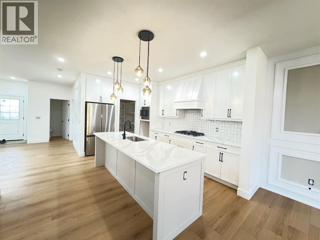 709 Mandalay Avenue, Carstairs, Alberta  T0M 0N0 - Photo 7 - A2287159