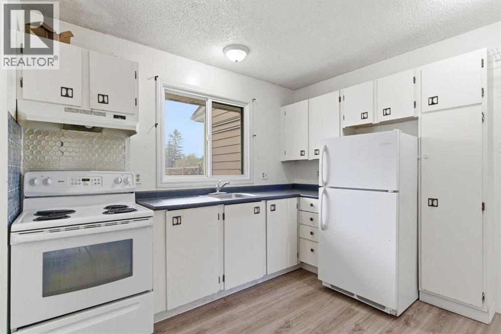 804 Madeira Drive Ne, Calgary, Alberta T2A 7B7 - Photo 5 - A2312298