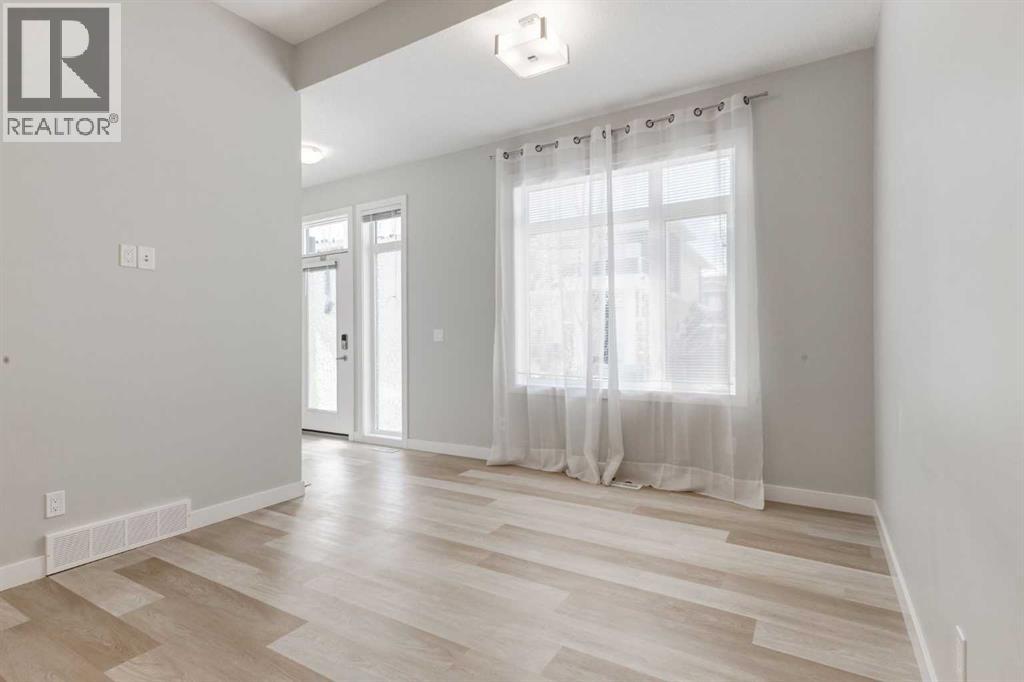 212 Crestbrook Common SW, Calgary, Alberta  T3B 6L1 - Photo 6 - A2308677