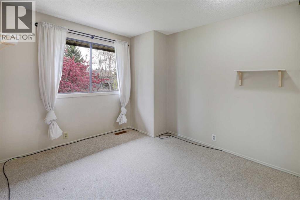 82 Point Drive Nw, Calgary, Alberta  T3B 5B3 - Photo 20 - A2314346