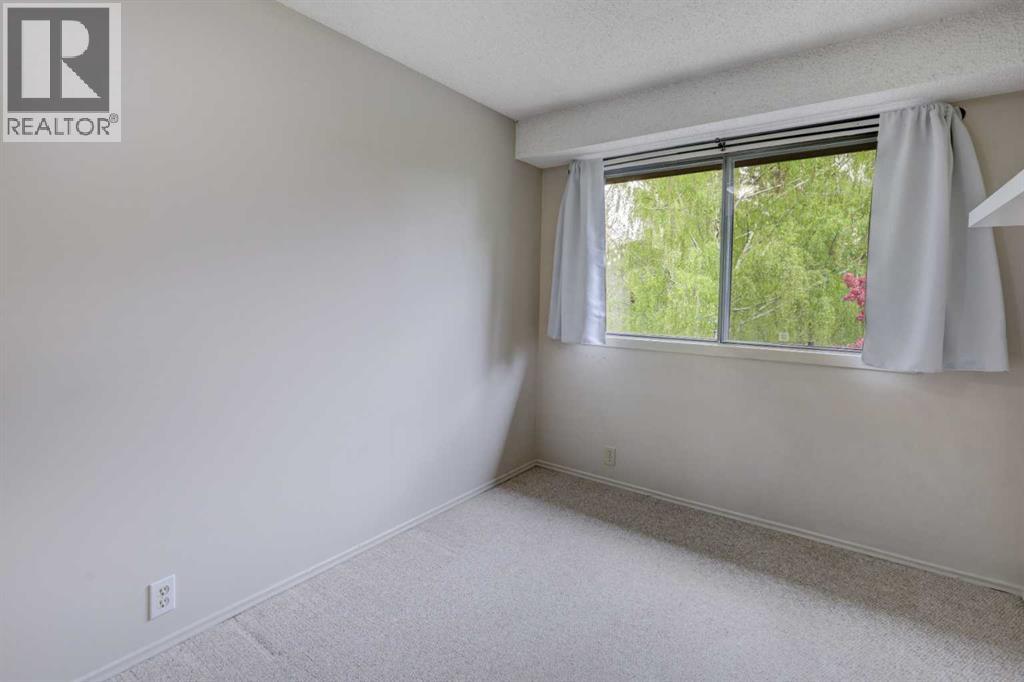 82 Point Drive Nw, Calgary, Alberta  T3B 5B3 - Photo 22 - A2314346