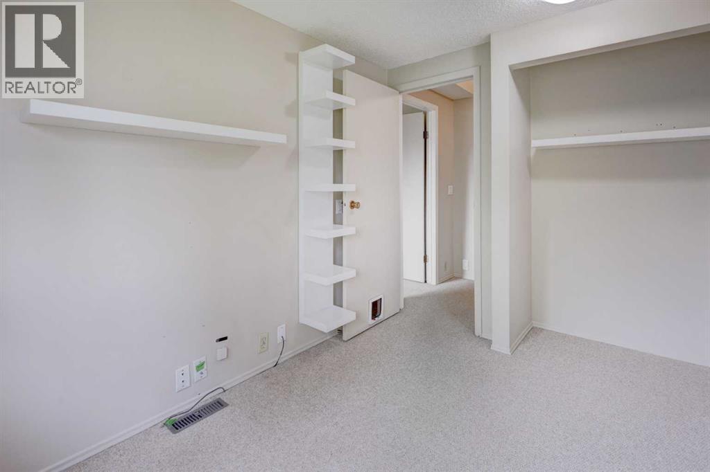 82 Point Drive Nw, Calgary, Alberta  T3B 5B3 - Photo 23 - A2314346