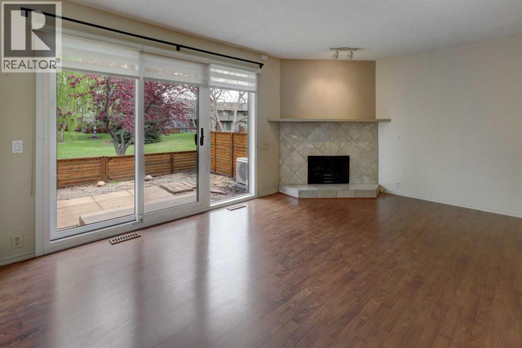 82 Point Drive Nw, Calgary, Alberta  T3B 5B3 - Photo 3 - A2314346