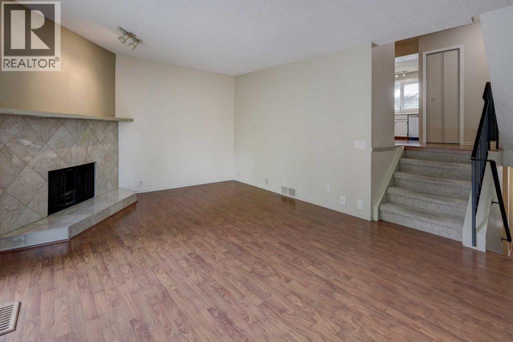 82 Point Drive Nw, Calgary, Alberta  T3B 5B3 - Photo 4 - A2314346