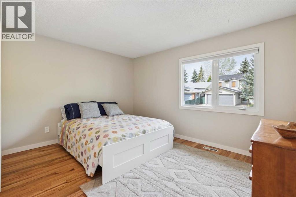 68 Woodmont Rise Sw, Calgary, Alberta  T2W 4L5 - Photo 32 - A2309817