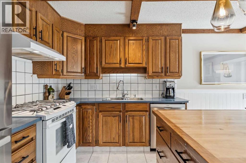 68 Woodmont Rise Sw, Calgary, Alberta  T2W 4L5 - Photo 15 - A2309817