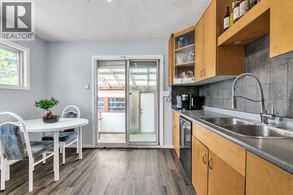 3156 Blakiston Drive NW, Calgary, Alberta  T2L 1L8 - Photo 3 - A2313668