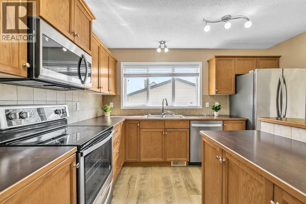 247 Evermeadow Avenue Sw, Calgary, Alberta  T2Y 4X2 - Photo 12 - A2310108