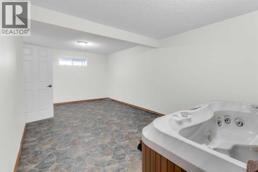 4, 604 Griffin Road W, Cochrane, Alberta  T4C 1X2 - Photo 21 - A2305404