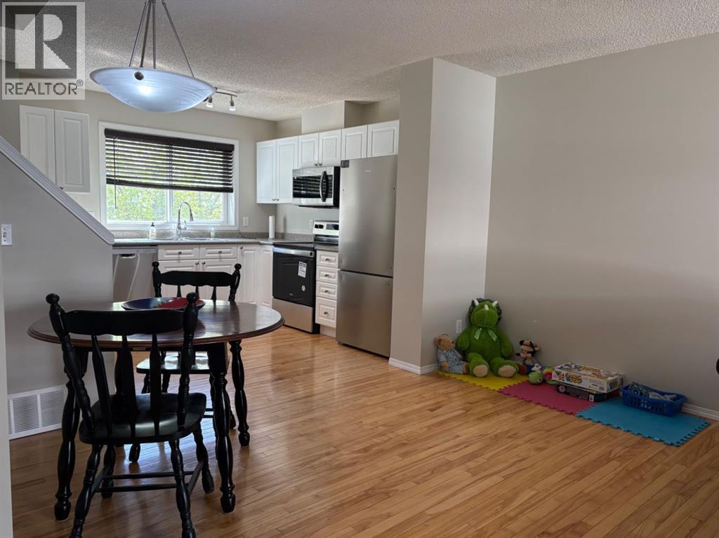 155 Tuscany Springs Gardens Nw, Calgary, Alberta  T3L 2R5 - Photo 7 - A2306897