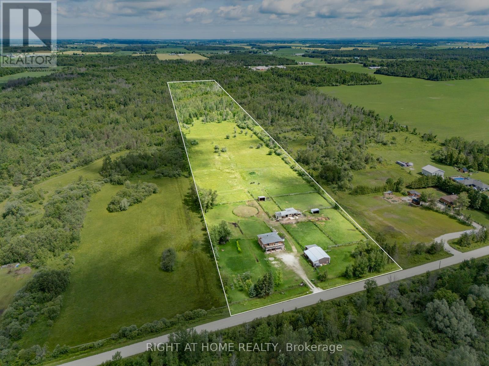 20+ acre farm configured for the horse enthusiast,  offering in-law potential or farm sitter space. The upper level features 2 bedrooms, 1 full bathroom,  kitchen/living area with a walkout to large front deck. The lower level includes a second kitchen, second living room, third bedroom, second 3 piece bathroom, and walkout to front patio and/or  back deck. Outside, the property is equipped for horses with 6 paddocks, round ring, a stable consisting of 3 single stalls and 1 double stall, 3 run-in shelters,  a drive shed/garage/workshop with a tack room, and expansive pasture space.  Both the stable and drive shed are serviced with hydro and water. Drive shed/garage/workshop includes mezzanine storage. Pond located on the property. BONUS: Chimney rebuilt inner and outer, patio redone, new deck stairs, new garden door, new front door, newly tiled front hall and fireplace surround, newly titled kitchen backsplash, windows 10 years old (minus patio door and living room), Water softener and UV Filtration system are serviced regularly. (id:48254)