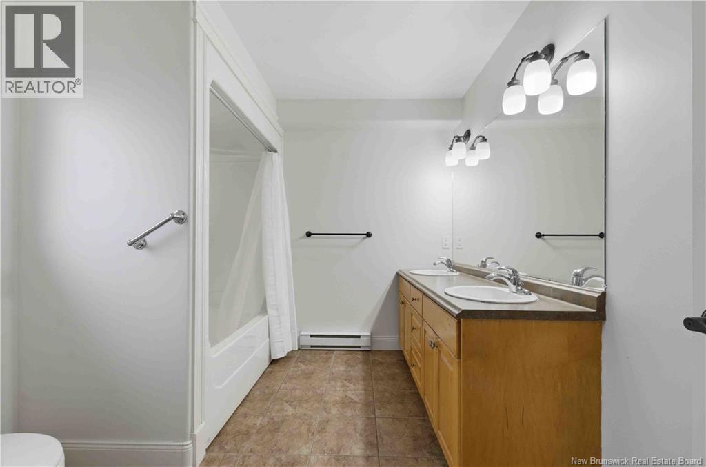 9 Sunny Brae Drive Unit# 207, Devon, New Brunswick  E3A 8H4 - Photo 24 - NB140252