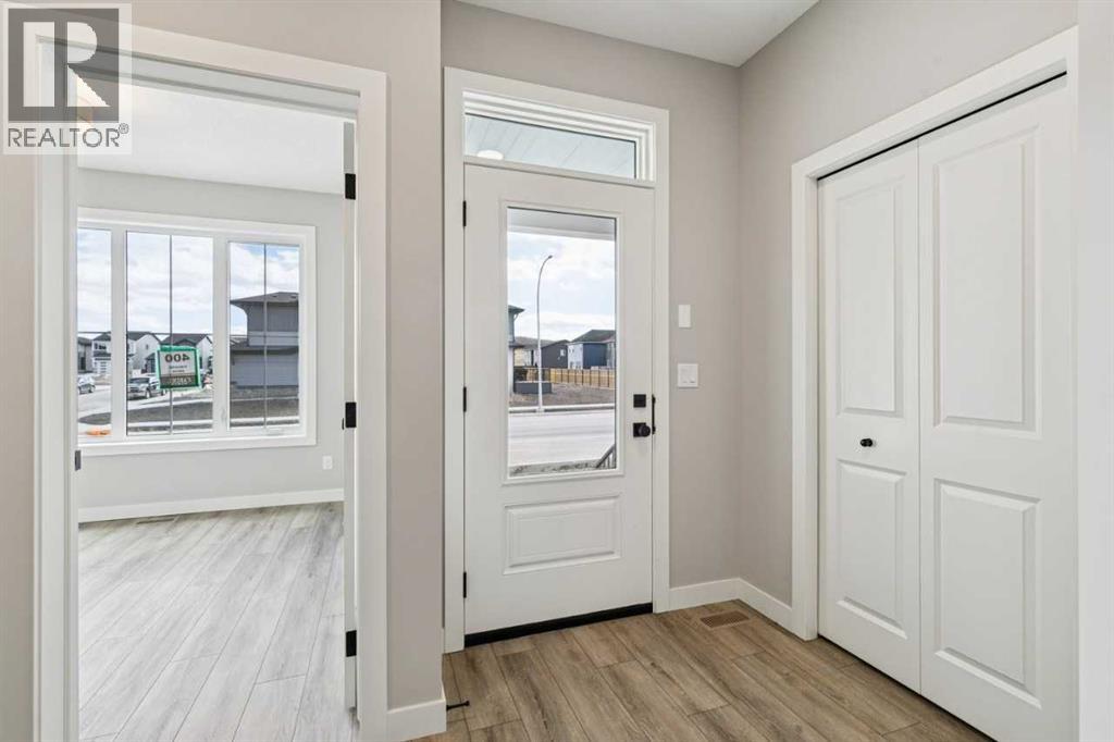 400 Fireside Drive, Cochrane, Alberta  T4C 3E1 - Photo 3 - A2313073