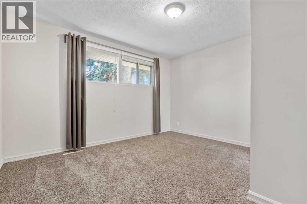 2420 Langriville Drive SW, Calgary, Alberta  T3E 5G8 - Photo 18 - A2312635
