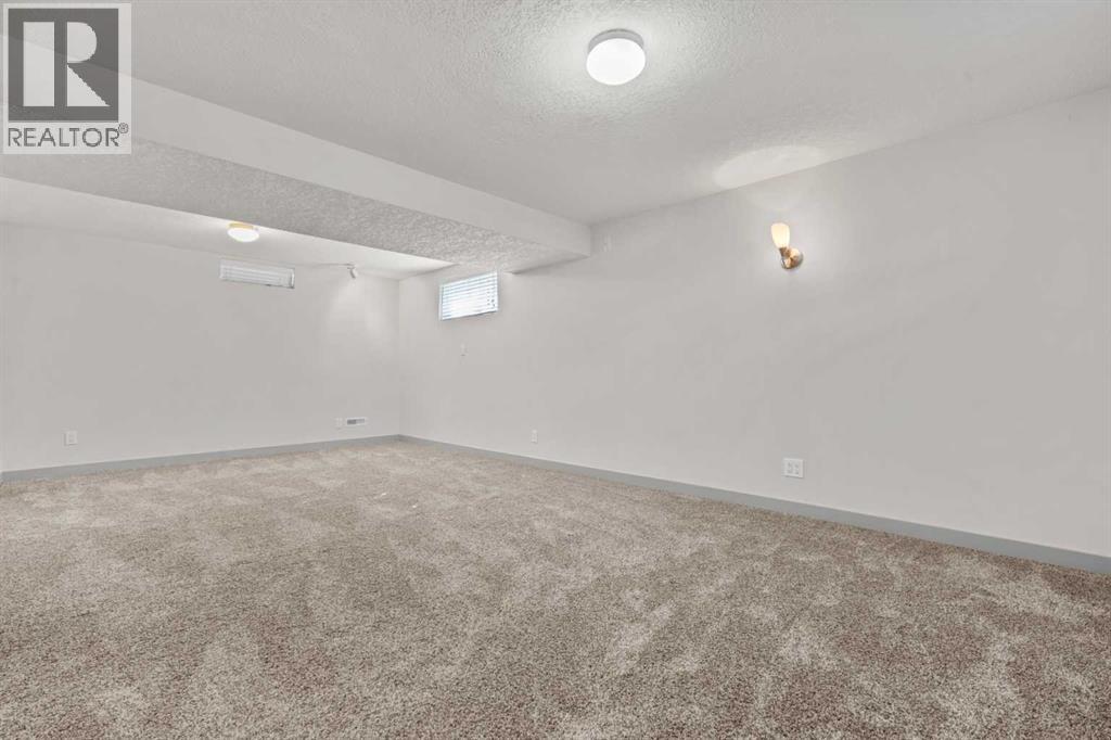 2420 Langriville Drive SW, Calgary, Alberta  T3E 5G8 - Photo 31 - A2312635