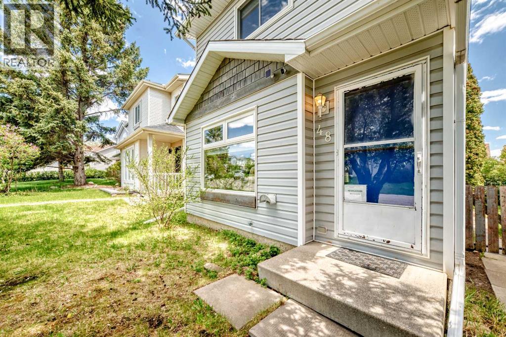 48 Millcrest Way SW, Calgary, Alberta  T2Y 2J4 - Photo 5 - A2313662