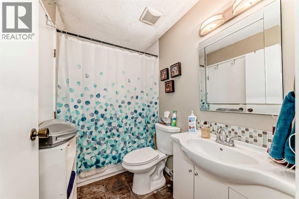 48 Millcrest Way SW, Calgary, Alberta  T2Y 2J4 - Photo 34 - A2313662