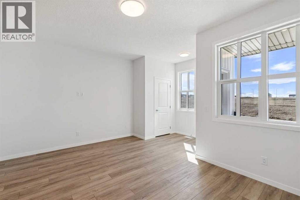74 Lucas Heath NW, Calgary, Alberta  T3P 2Y2 - Photo 6 - A2303606