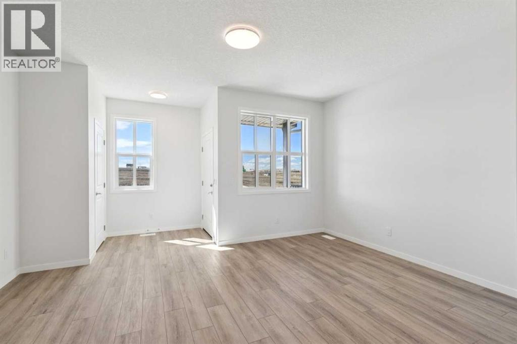 74 Lucas Heath NW, Calgary, Alberta  T3P 2Y2 - Photo 7 - A2303606
