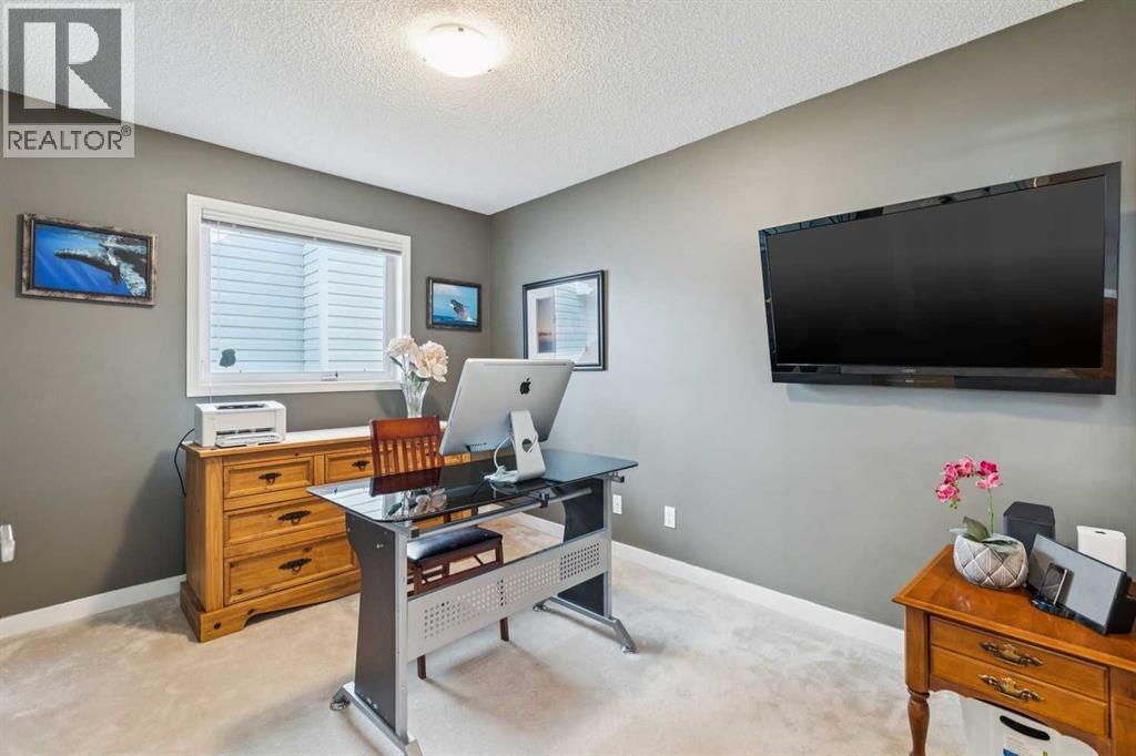 420 Rocky Ridge Bay NW, Calgary, Alberta  T3G 4H8 - Photo 11 - A2306006