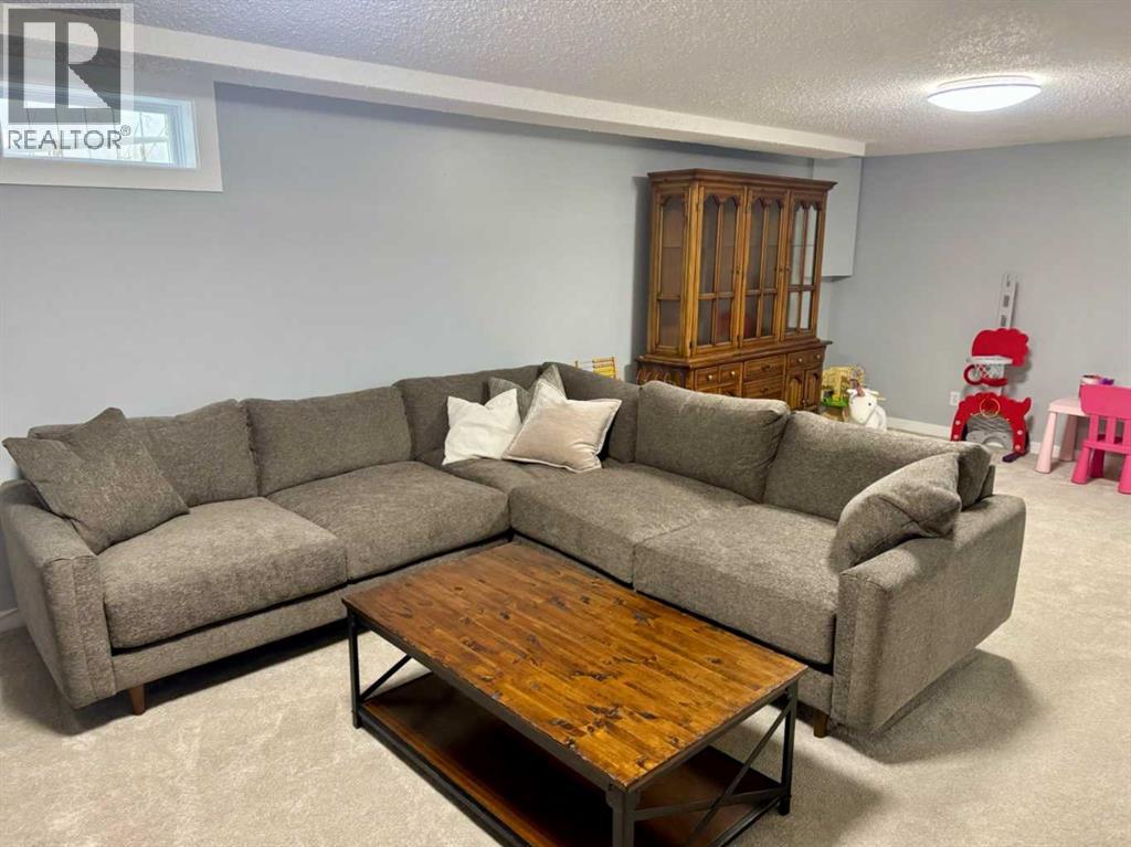 16 Woodfield Court SW, Calgary, Alberta  T2W 3W5 - Photo 22 - A2311061