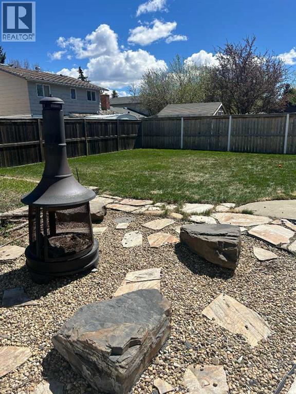 16 Woodfield Court SW, Calgary, Alberta  T2W 3W5 - Photo 24 - A2311061