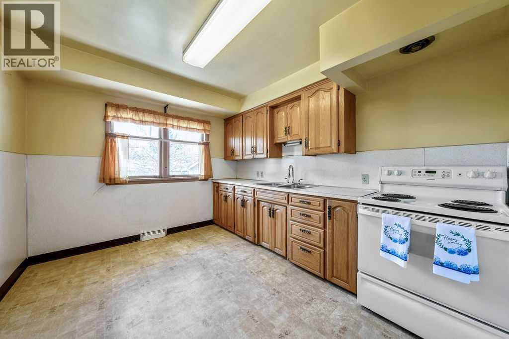 1447 Renfrew Drive NE, Calgary, Alberta  T2E 5J4 - Photo 5 - A2310914