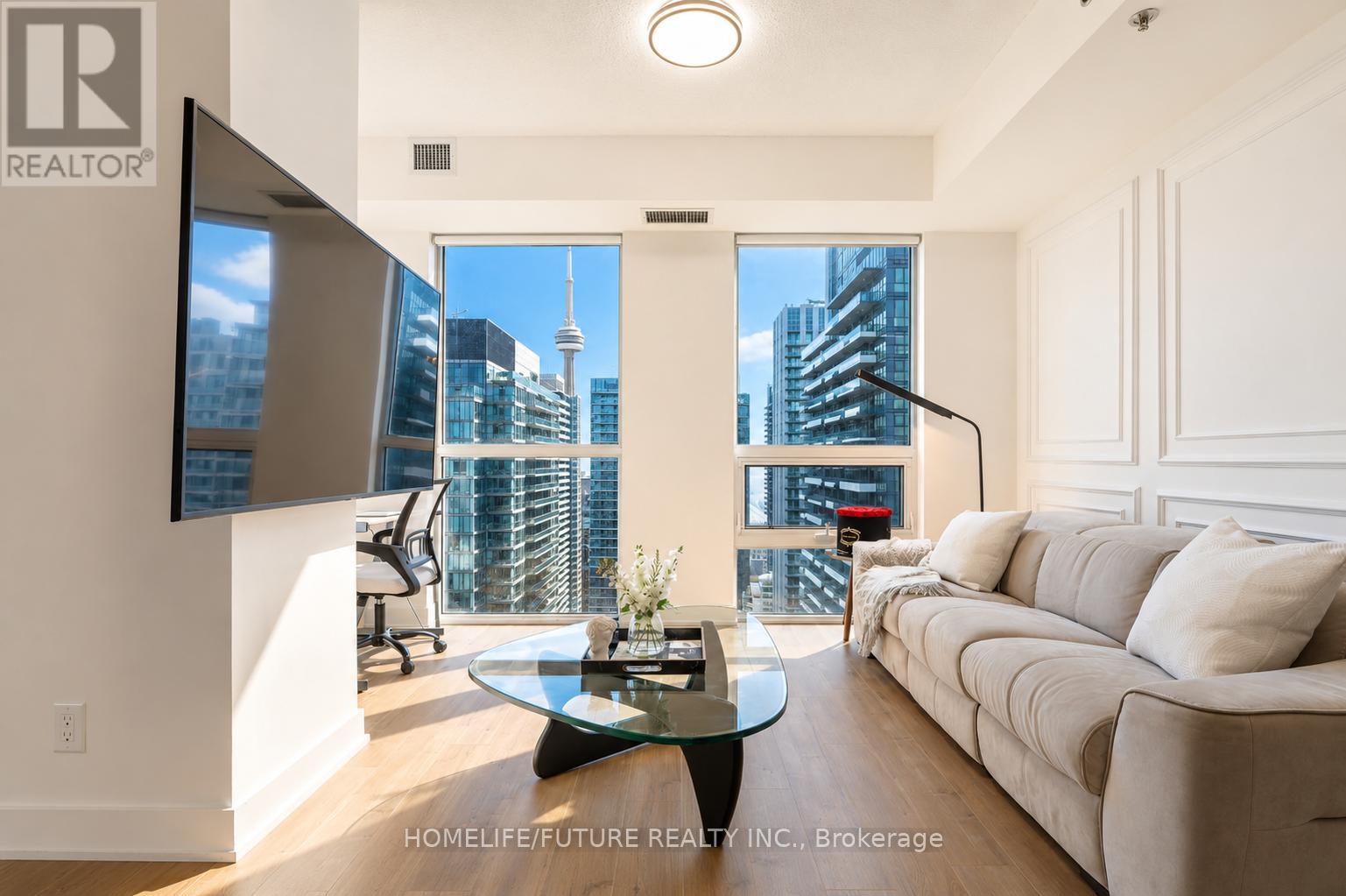 <div class="slider-price">$648,880</div><p>3805 - 318 Richmond Street W, Toronto, Ontario</p>