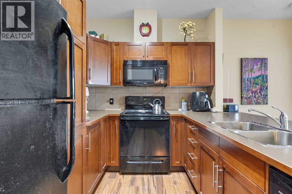 310, 48 Panatella Road NW, Calgary, Alberta  T3K 0V4 - Photo 10 - A2308528