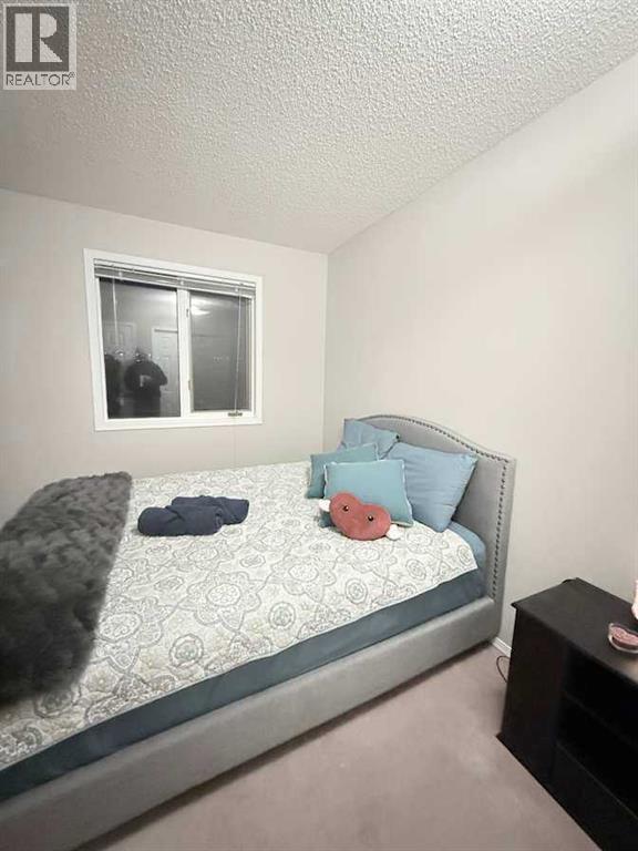 7212 Sierra Morena Boulevard SW, Calgary, Alberta  T3H 3G5 - Photo 13 - A2308935
