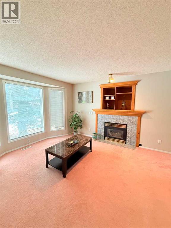 7212 Sierra Morena Boulevard SW, Calgary, Alberta  T3H 3G5 - Photo 3 - A2308935