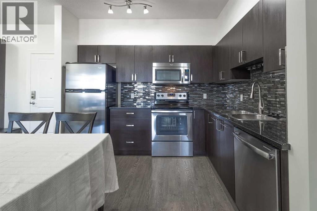 403, 117 Copperpond Common SE, Calgary, Alberta  T2Z 5E2 - Photo 6 - A2309558