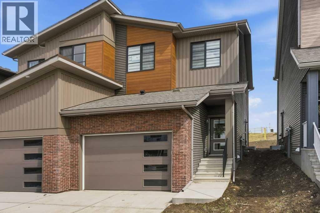 55 Heritage Manor, Cochrane, Alberta  T4C 3K7 - Photo 2 - A2314683