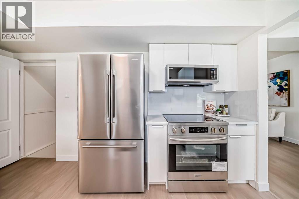619 Merrill Drive NE, Calgary, Alberta  T2E 8Y5 - Photo 10 - A2308498