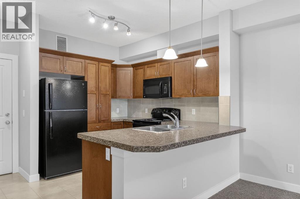 2108, 4 Kingsland Close Se, Airdrie, Alberta  T4A 0A2 - Photo 3 - A2309696
