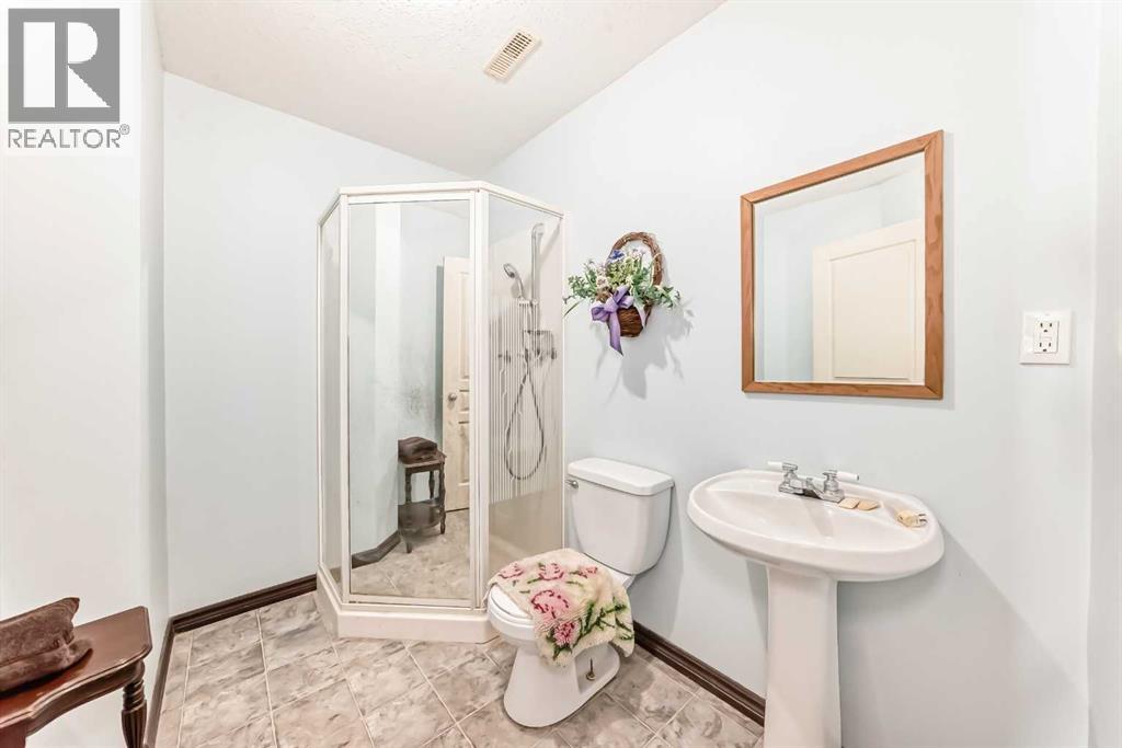 102 Robinson Avenue, Penhold, Alberta  T0M 1R0 - Photo 29 - A2309036