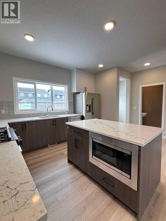 941 Reynolds Lane, Airdrie, Alberta  T4B 5L7 - Photo 7 - A2293514