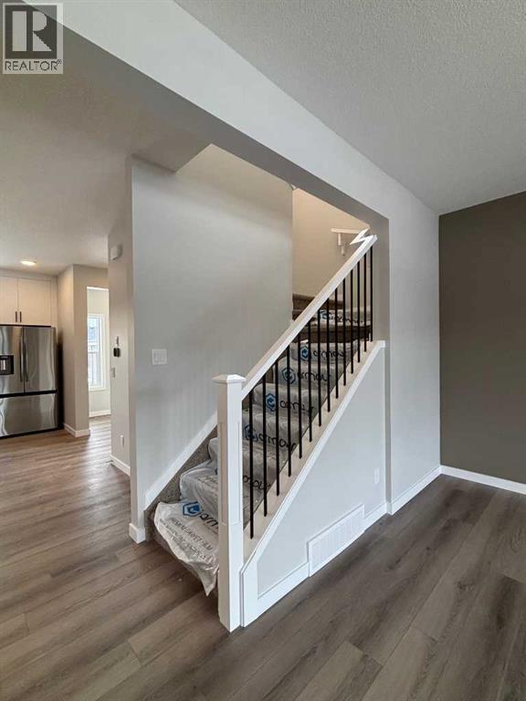 941 Reynolds Lane, Airdrie, Alberta  T4B 5L7 - Photo 4 - A2293514