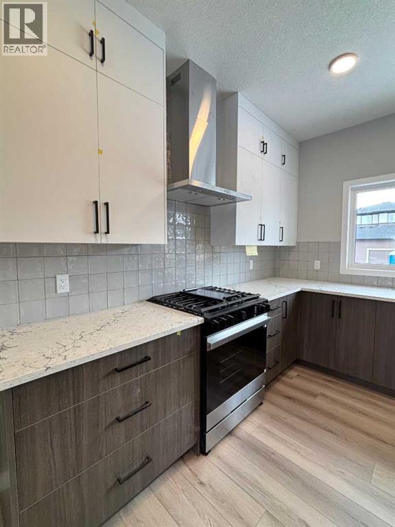 941 Reynolds Lane, Airdrie, Alberta  T4B 5L7 - Photo 6 - A2293514