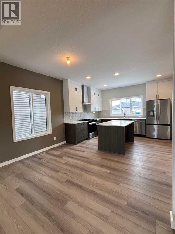 941 Reynolds Lane, Airdrie, Alberta  T4B 5L7 - Photo 5 - A2293514