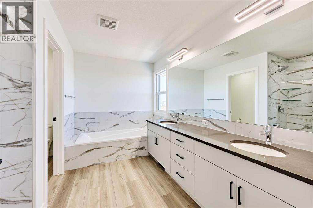 834 Alpine Drive SW, Calgary, Alberta  T2Y 0S4 - Photo 23 - A2304441