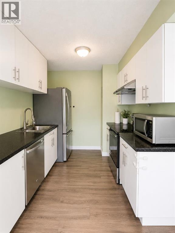 29, 4936 Dalton Drive NW, Calgary, Alberta  T3A 2E4 - Photo 4 - A2313110