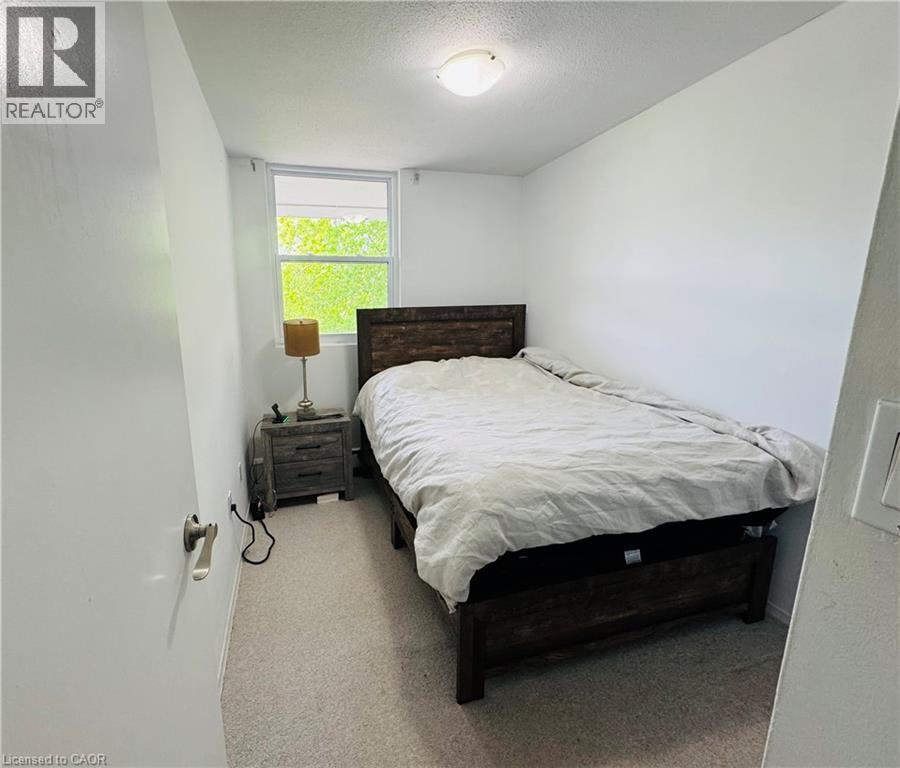 350 Quigley Road Unit# 222-Bedroom#3, Hamilton, Ontario  L8K 5N2 - Photo 7 - 40833917