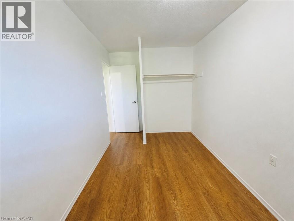 350 Quigley Road Unit# 222-Bedroom#3, Hamilton, Ontario  L8K 5N2 - Photo 6 - 40833917