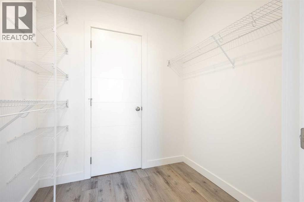 405, 205 Spring Creek Common Sw, Calgary, Alberta  T3H 6H4 - Photo 19 - A2295322
