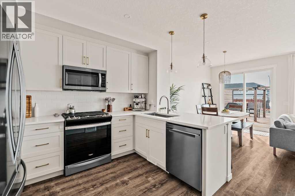 77 Magnolia Heath Se, Calgary, Alberta  T3M 2Z7 - Photo 4 - A2312473